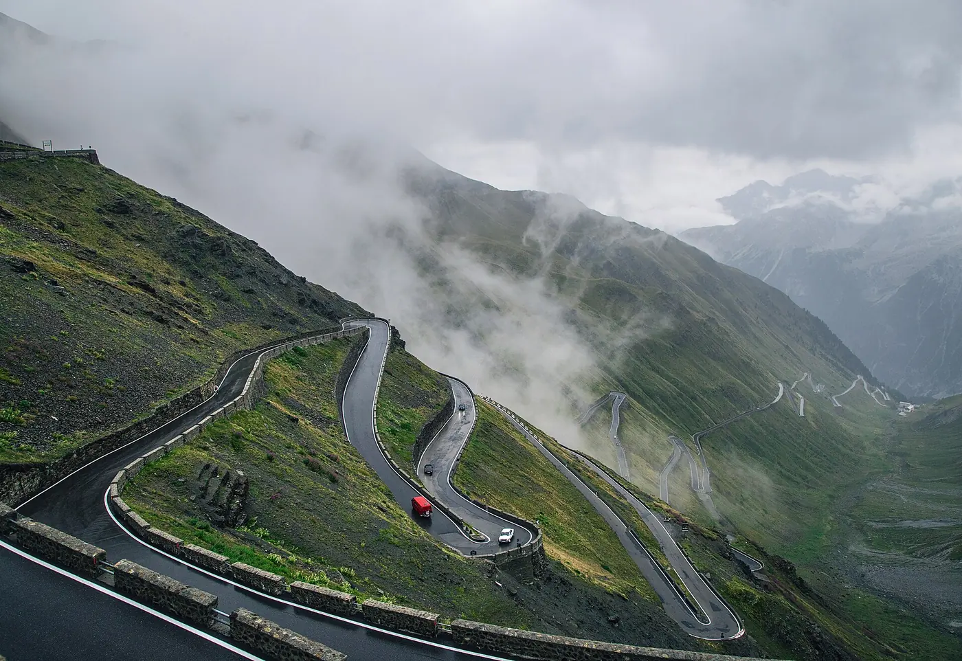 Switchbacks on the Stelvio Pass in low cloud, Italy