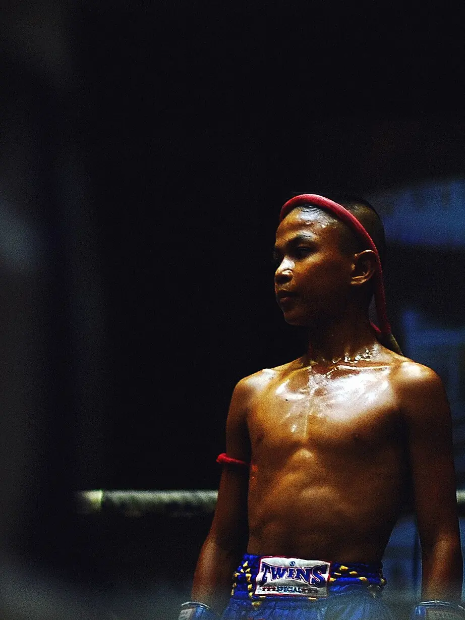 A young Muay Thai fighter in the ring in Phuket